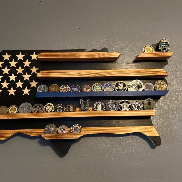 Thin Blue Line Challenge Coin Holder Wall Art shaped like American flag with wooden shelves displaying police and military challenge coins