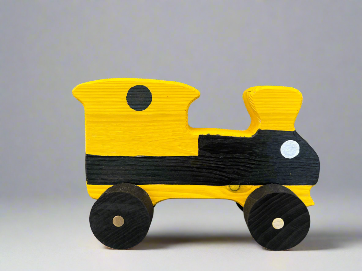 Handcrafted wooden train kids pull toy in yellow and black with simple round wheels