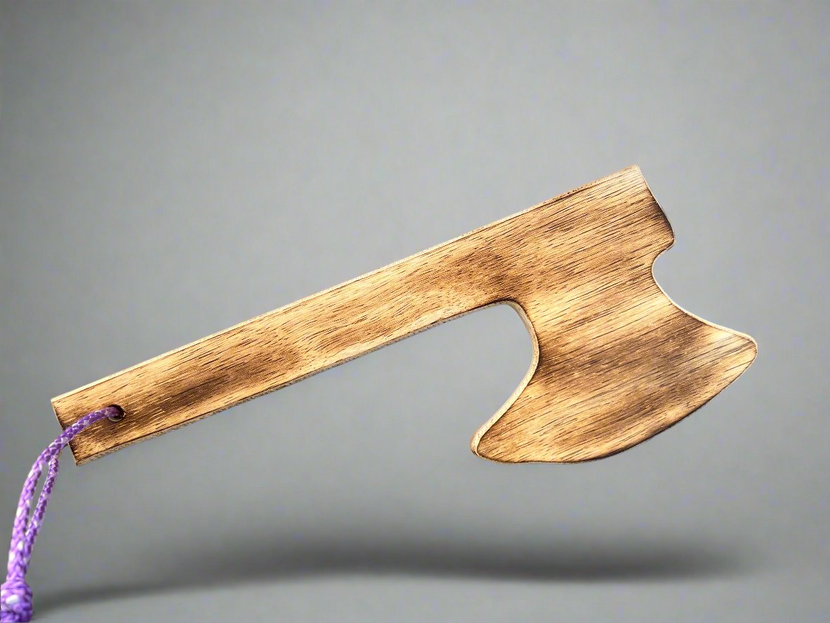 Brown kids wooden axe and shield toy set wooden axe with a purple string attached