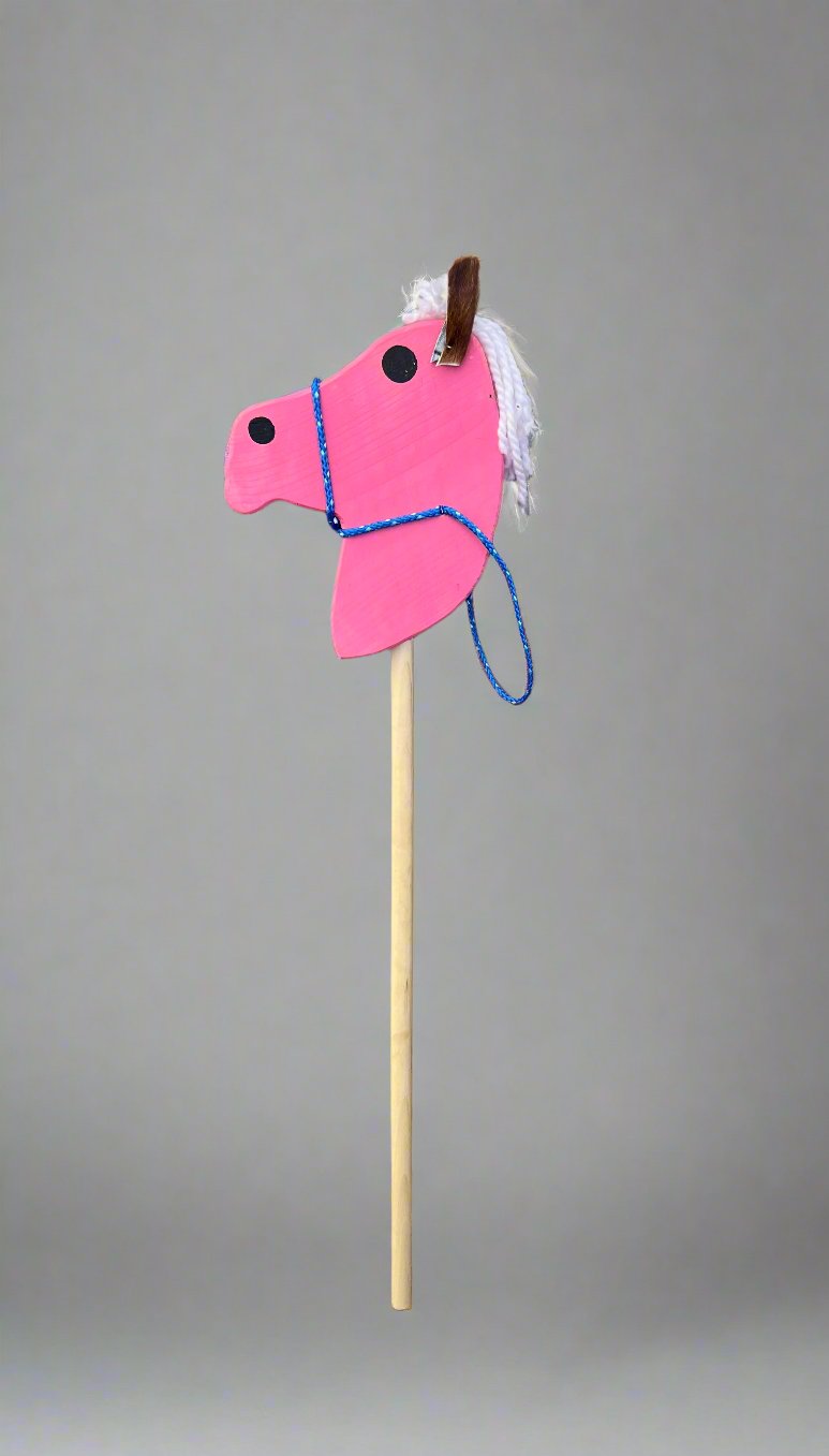 Pink kids wooden hobby horses with white yarn mane and blue rope bridle on wooden stick