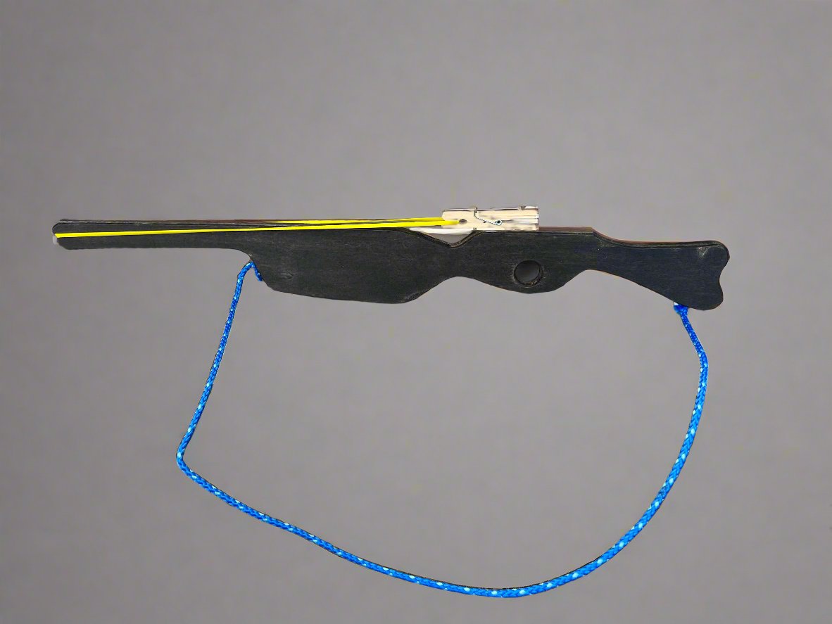 Black kids wooden rubber band launcher toy with blue string and yellow rubber band