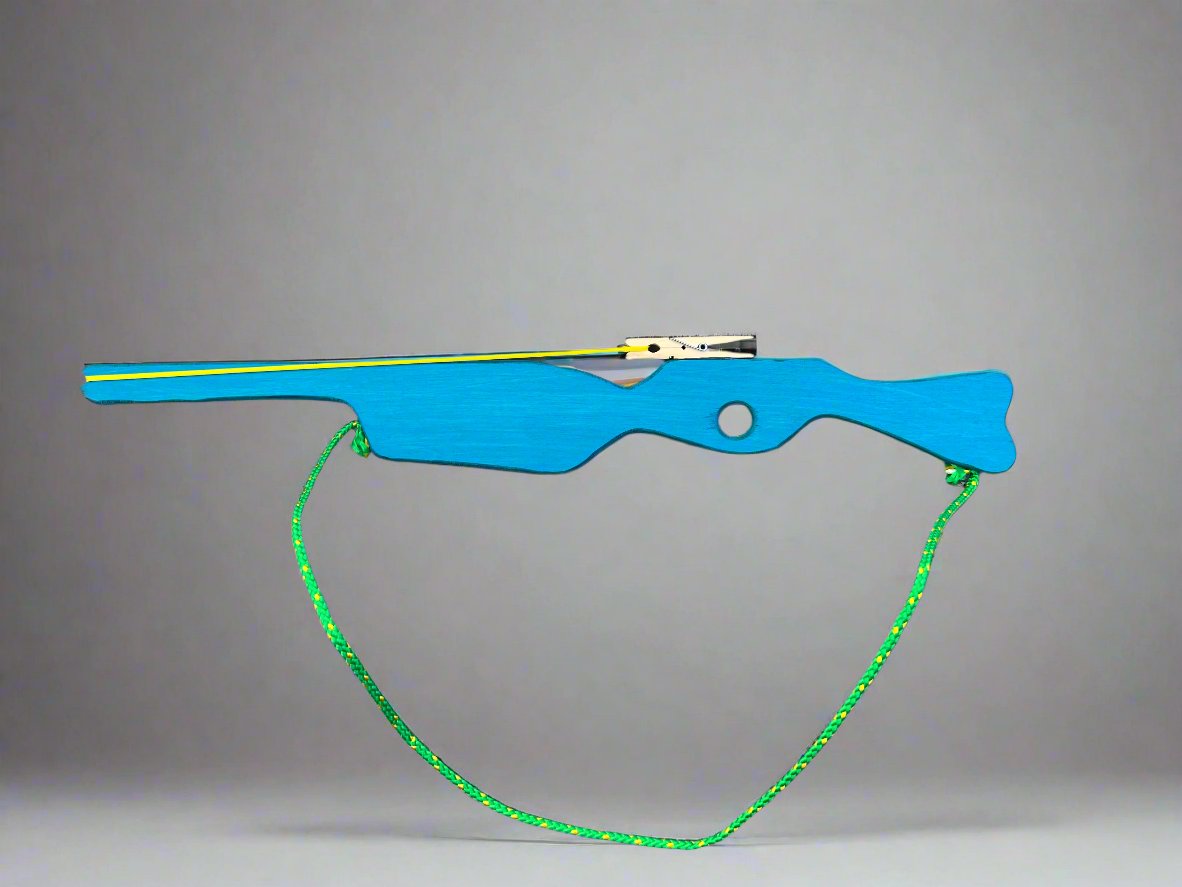 Blue kids wooden rubber band launcher toy with a green strap and simple wooden design