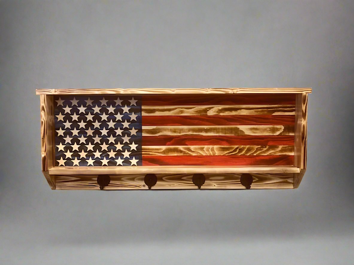 Rustic wood hat rack featuring American flag design with five black metal hooks for hanging