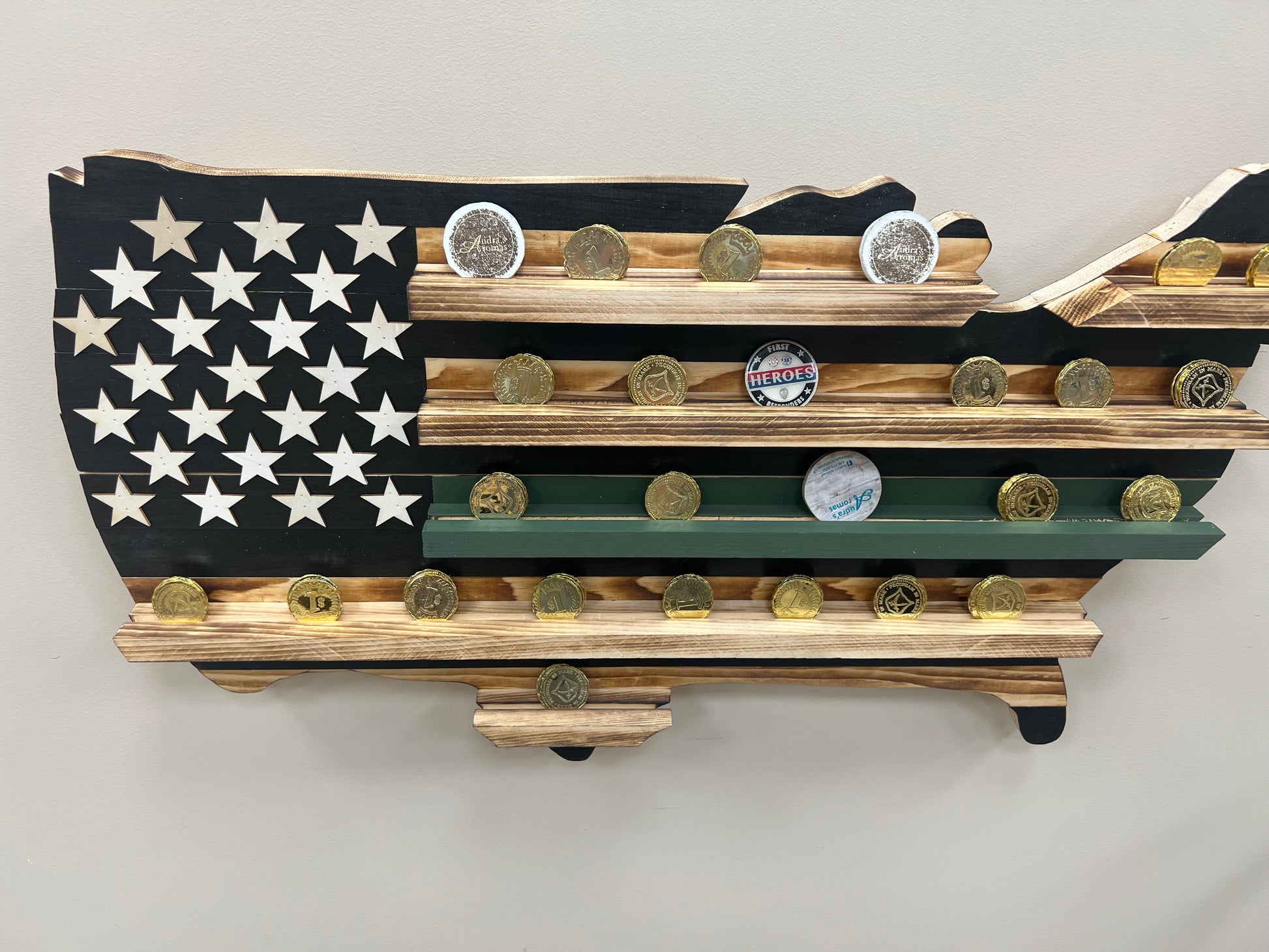 Thin green line wooden flag challenge coin holder wall display with multiple challenge coins