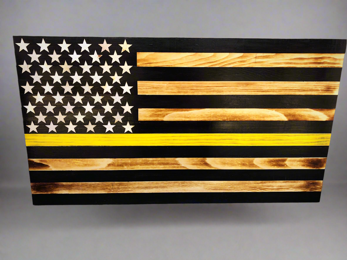 Thin yellow line wooden flag tow truck made of burnt wood with black and natural stripes and stars