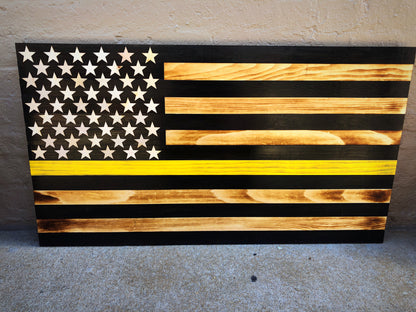 Thin yellow line wooden flag tow truck design with burned wood and black stripes for wall decor