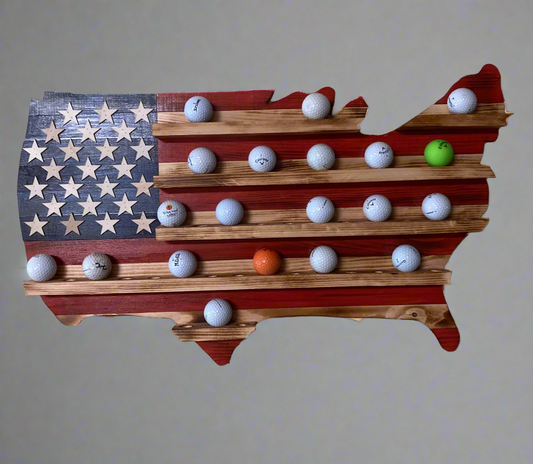 USA flag golfball display case shaped like the United States with wooden shelves holding golf balls