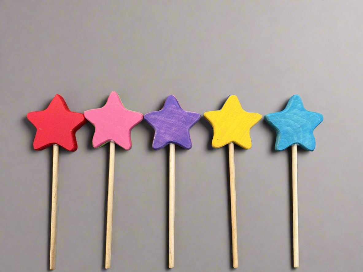Colorful wooden magic wand toy set with red pink purple yellow and blue star shapes on sticks