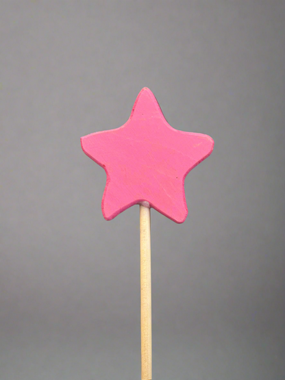 Pink star-shaped colorful wooden magic wand toy with natural wooden handle