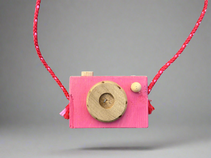 Handmade kids wooden camera in pink with red strap for imaginative play