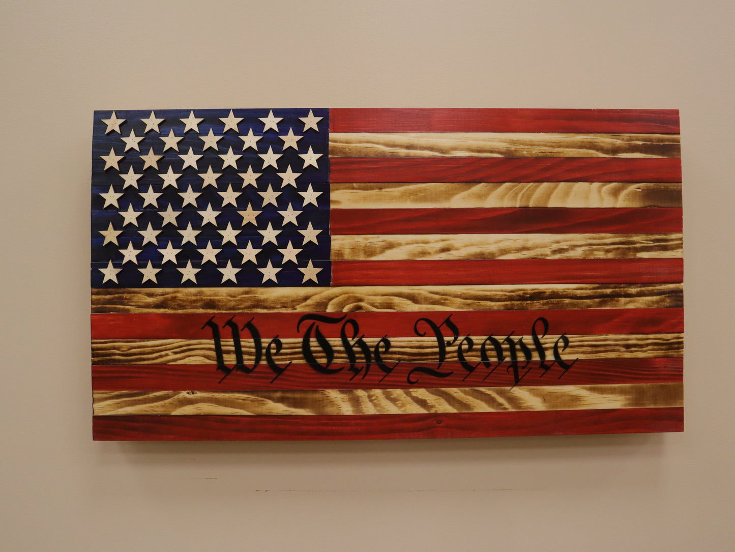We the People Wooden Flag Wall Art with American flag design and rustic wood finish