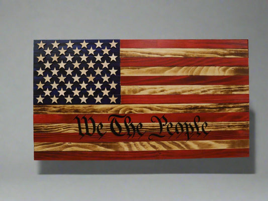 We the People Wooden Flag Wall Art featuring American flag design with engraved patriotic text