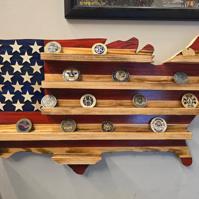 Wooden USA map coin holder with multiple shelves displaying collectible coins against a painted American flag design