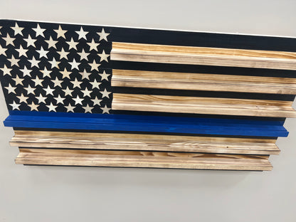 Wooden blue line flag coin holder display featuring a stylized American flag with natural wood and blue accents