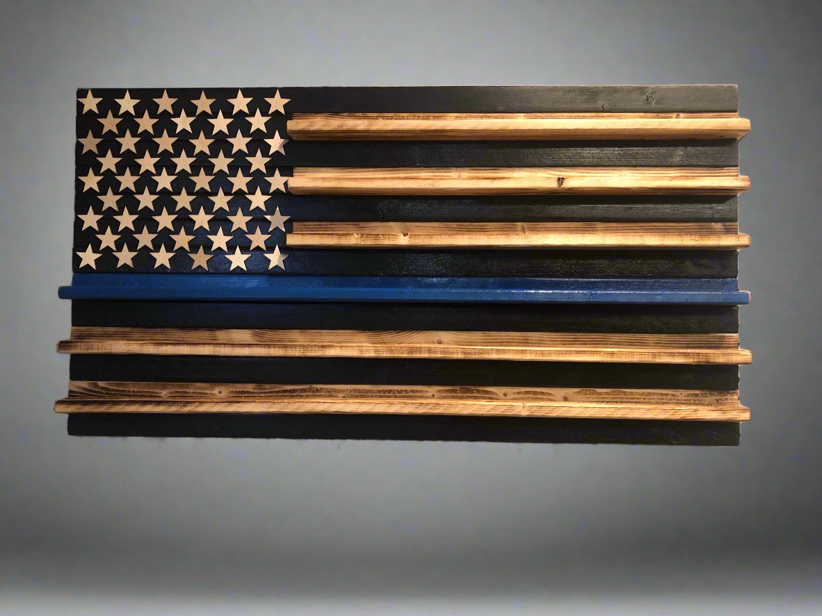 Wooden blue line flag coin holder display with American flag design and natural wood stripes