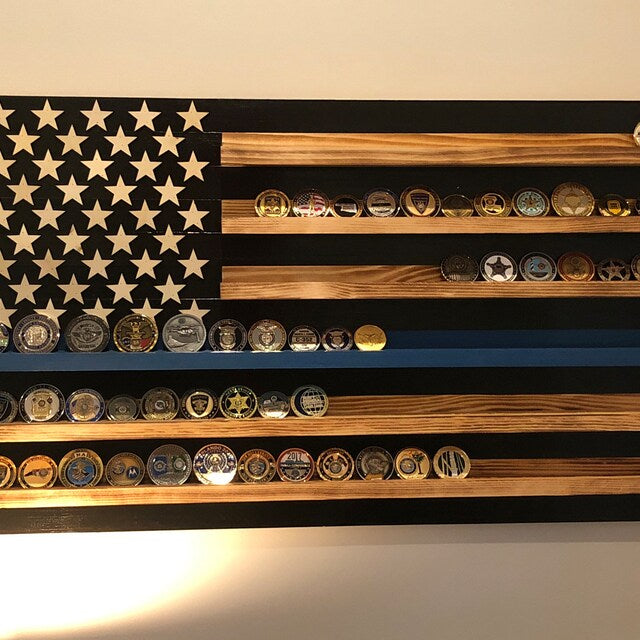 Wooden blue line flag coin holder display with multiple collectible coins arranged on shelves